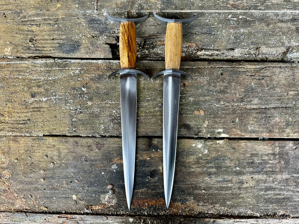
                  
                    Tod Cutler Antenna Dagger 11-14thC. Two pictured next to each other 
                  
                