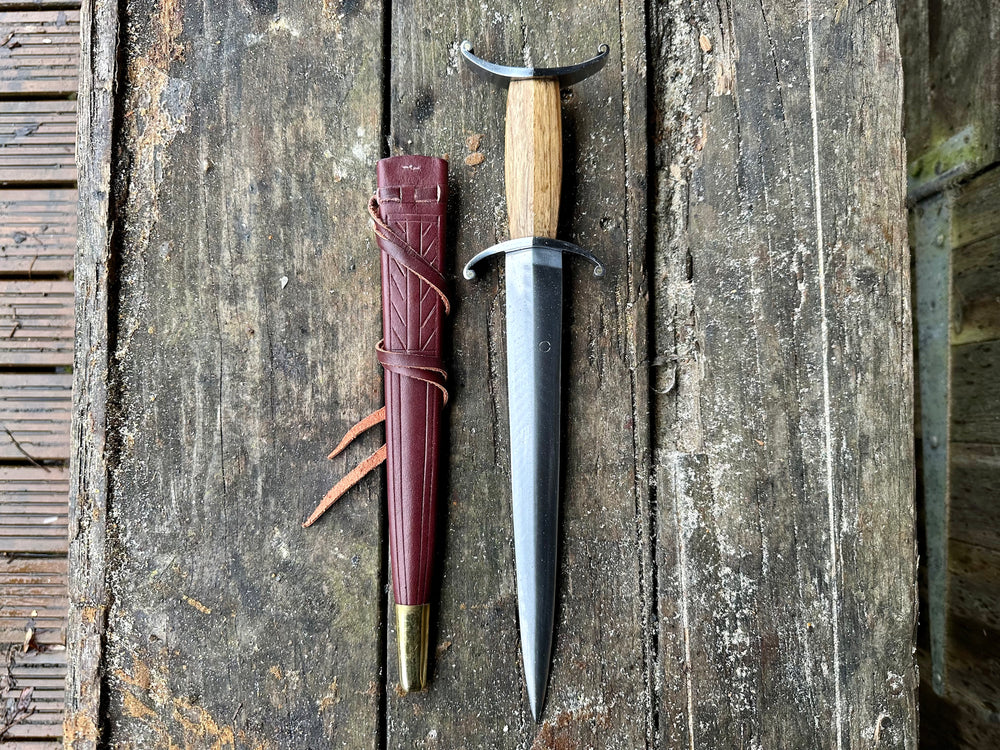 
                  
                    Tod Cutler Antenna Dagger 11-14thC with a red scabbard
                  
                