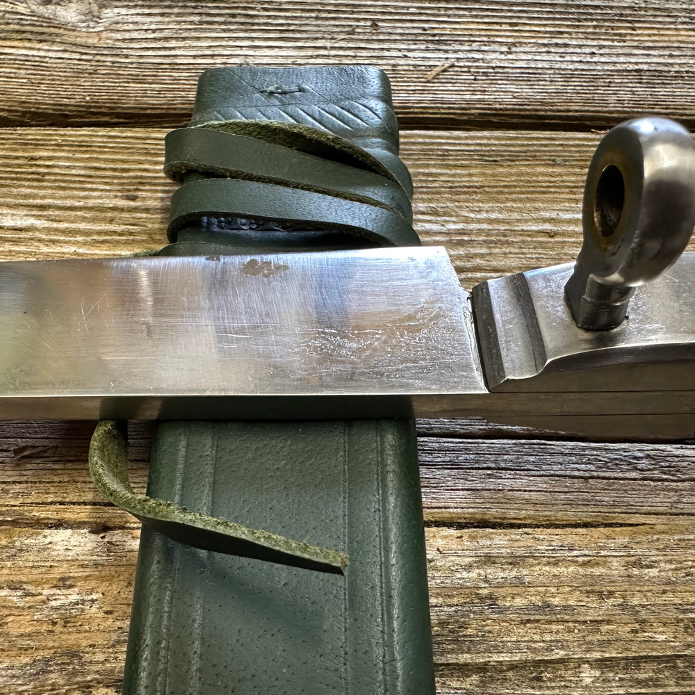 
                  
                    Rugger Bauernwehr with green scabbard.

                  
                