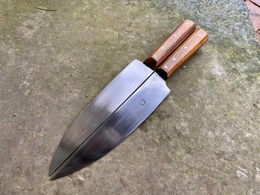 Tod Cutler Sheffield Trade knife on a stone background