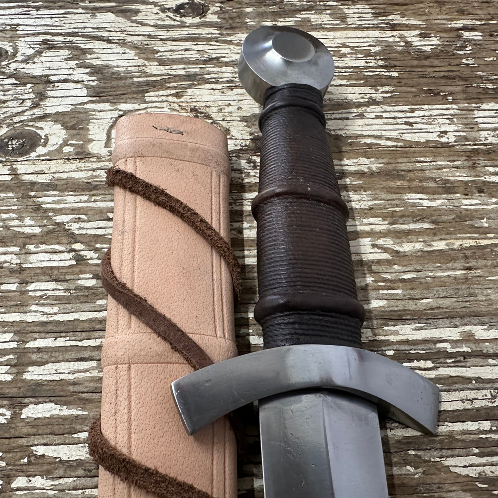 
                  
                    14thC Quillon Dagger with a natural scabbard
                  
                