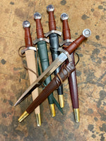 Tod Cutler Quillon daggers with green, red, black, brown and natural scabbards