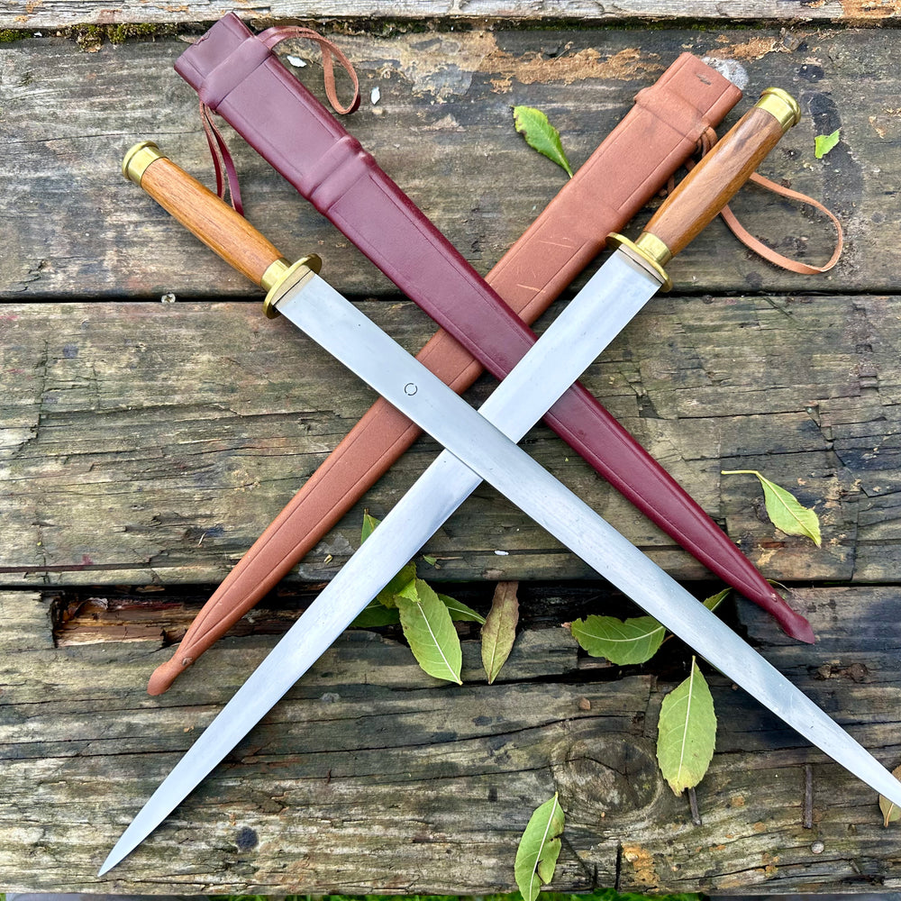 
                  
                    Tod Cutler Irish Scian with red and brown scabbards
                  
                