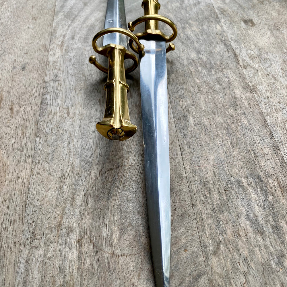 
                  
                    two Tod Cutler S quillon daggers 
                  
                