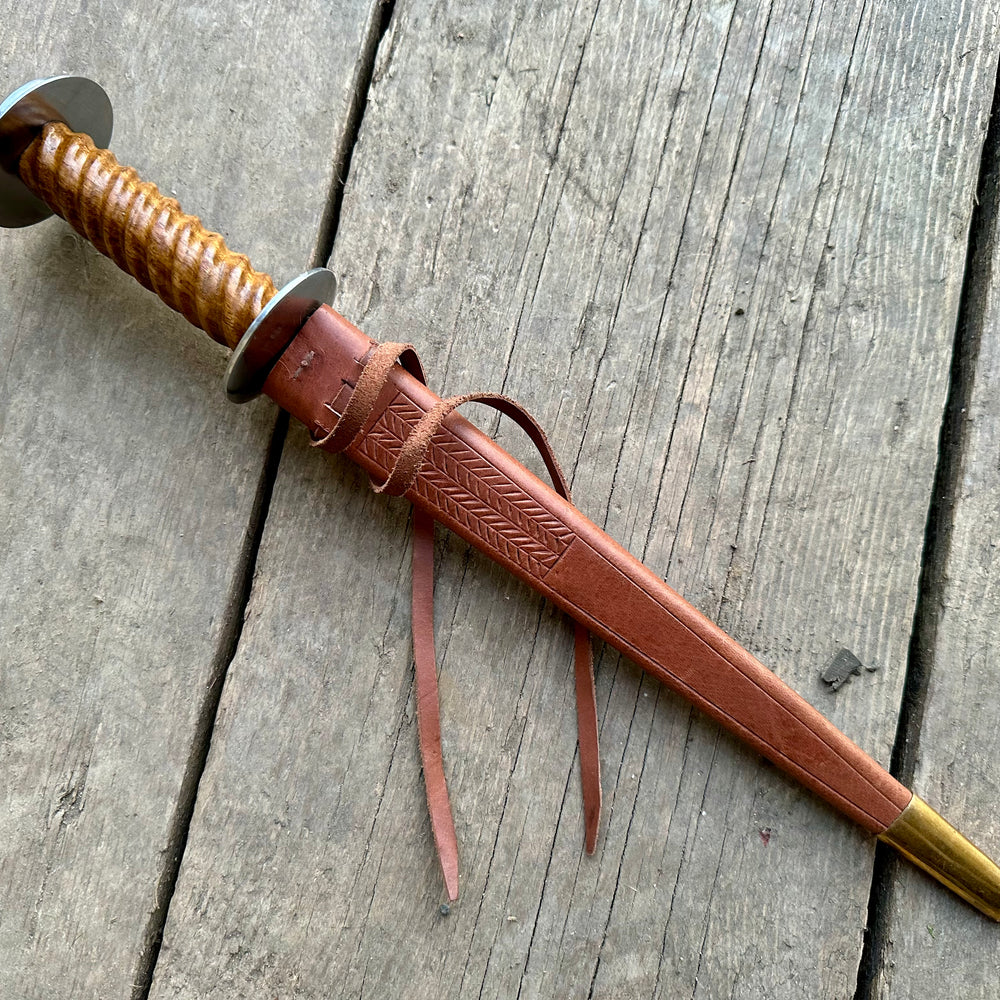 
                  
                    Tod Cutler Knight's Rondel in a brown scabbard
                  
                