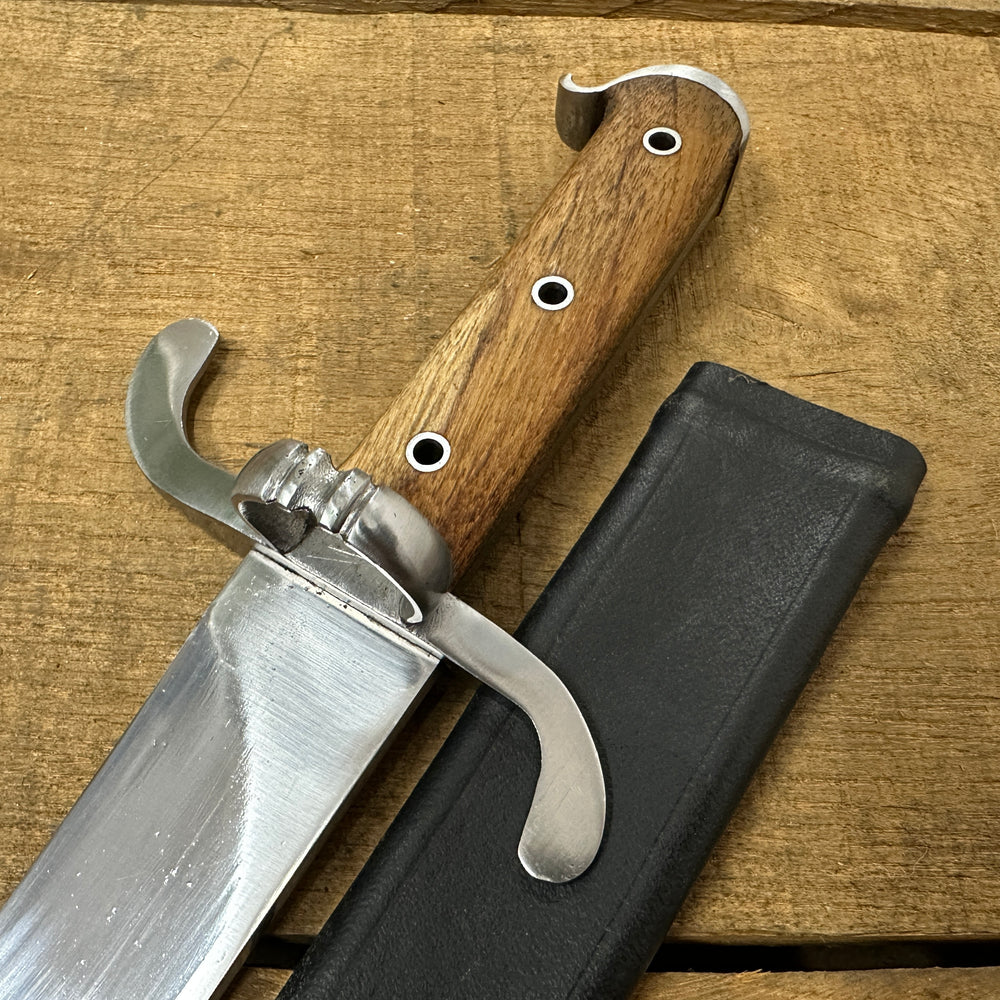
                  
                    Messer with a black scabbard
                  
                