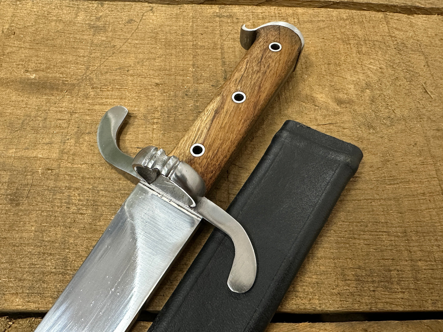 
                  
                    Messer with a black scabbard
                  
                