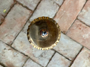
                  
                    Tod Cutler bronze hilted rondel on a brick background
                  
                