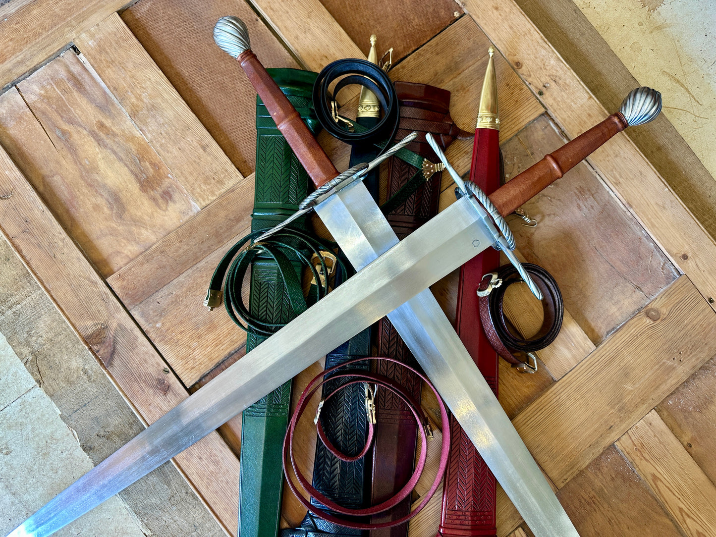 
                  
                    German War Sword. Two crossed swords on scabbards
                  
                