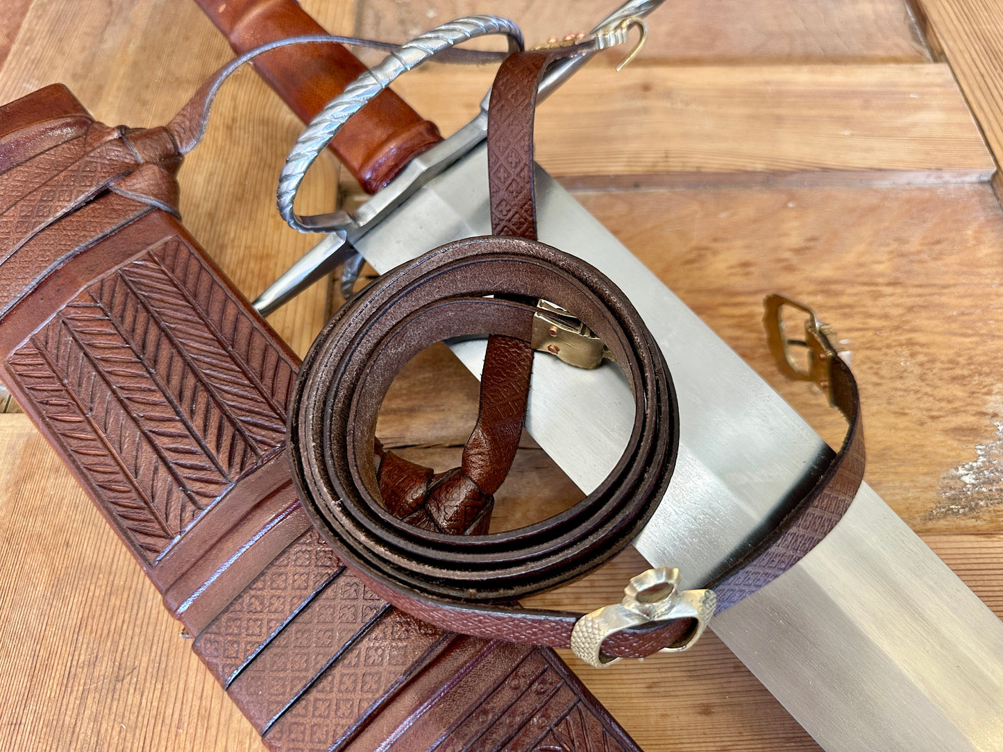 
                  
                    German War Sword. With brown scabbard
                  
                