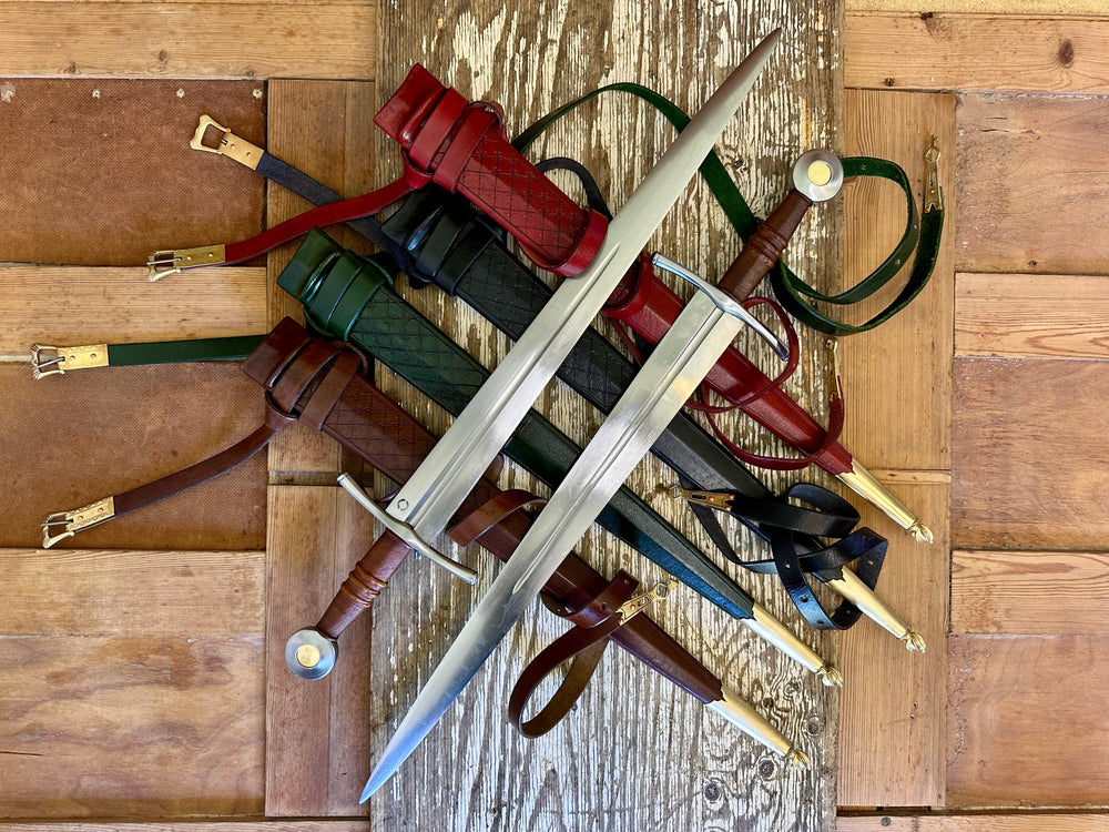 Two swords crossed on a bed of red, black, green and brown scabbards