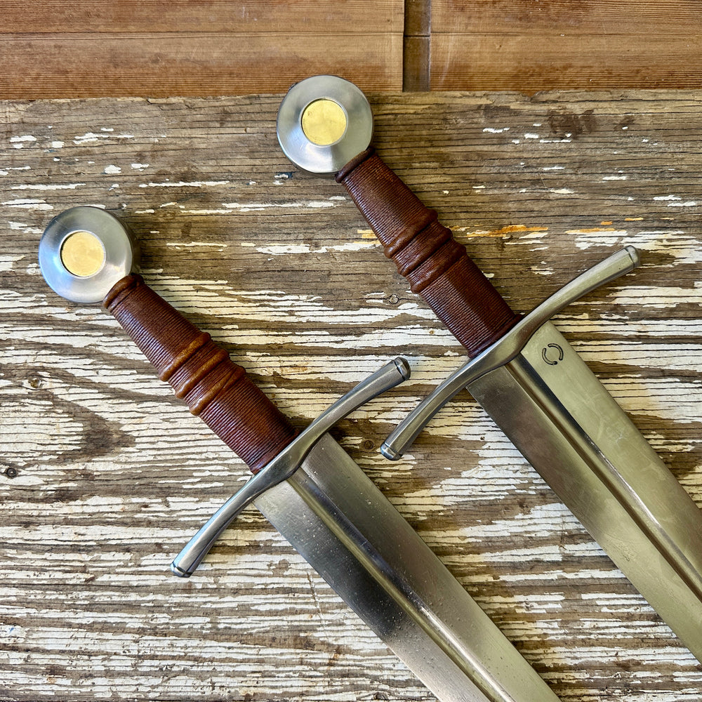 
                  
                    Close up of two hilts 
                  
                