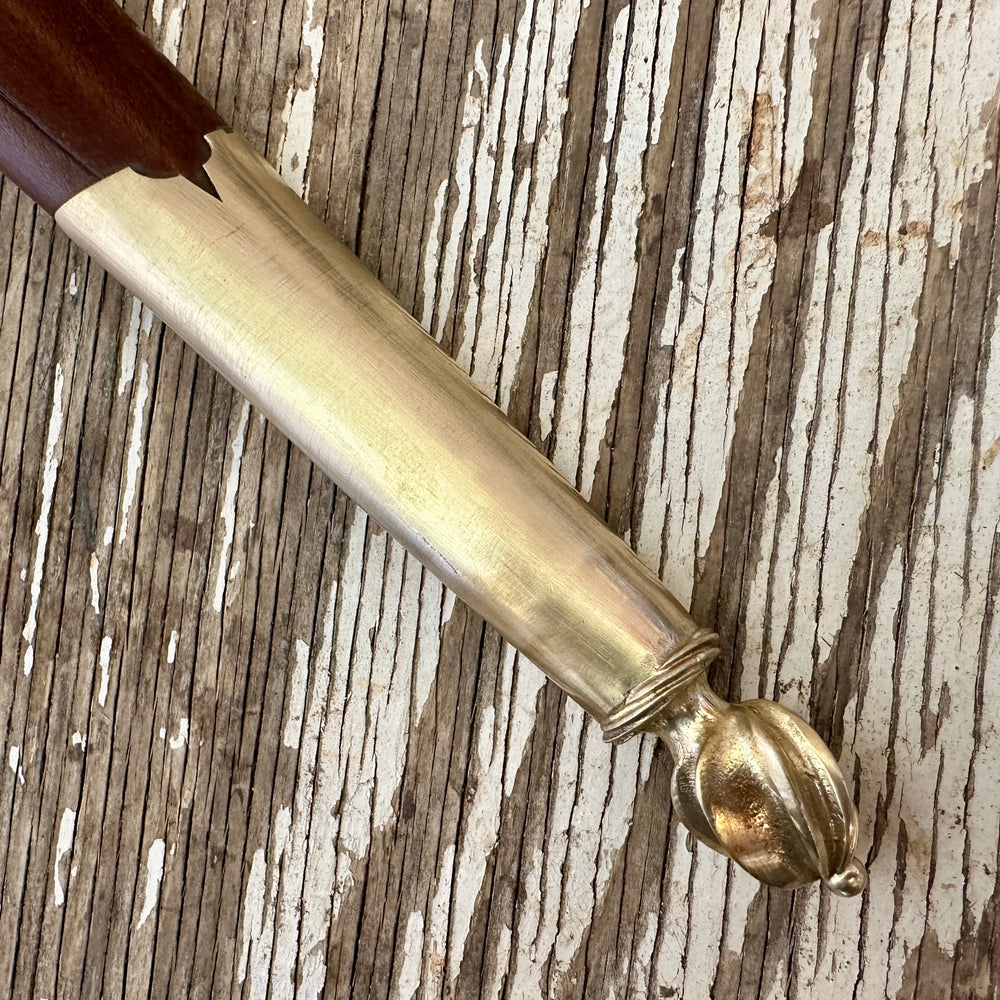 
                  
                    close up of sword chape
                  
                