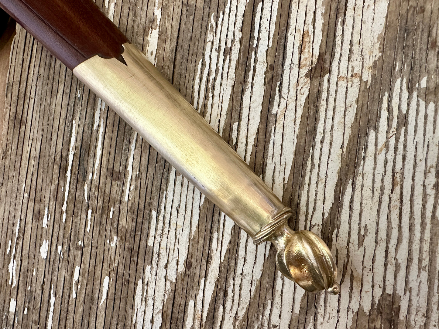
                  
                    close up of sword chape
                  
                