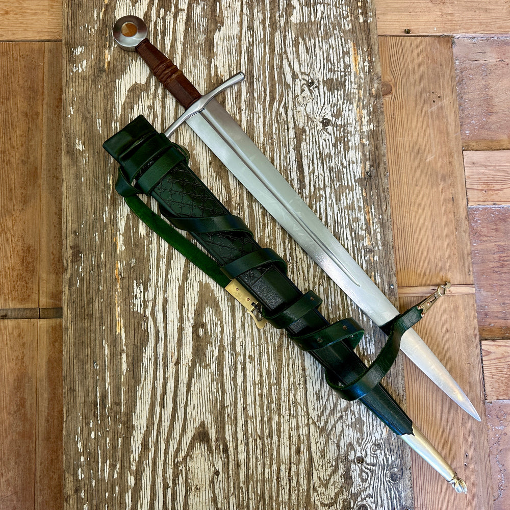 
                  
                    Coustille sword with a green scabbard
                  
                