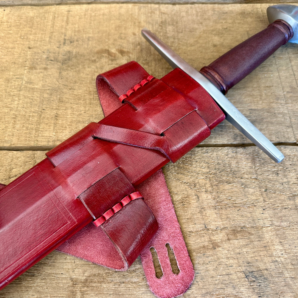 
                  
                    Viking Norman Brazil Nut Sword in a red scabbard 
                  
                
