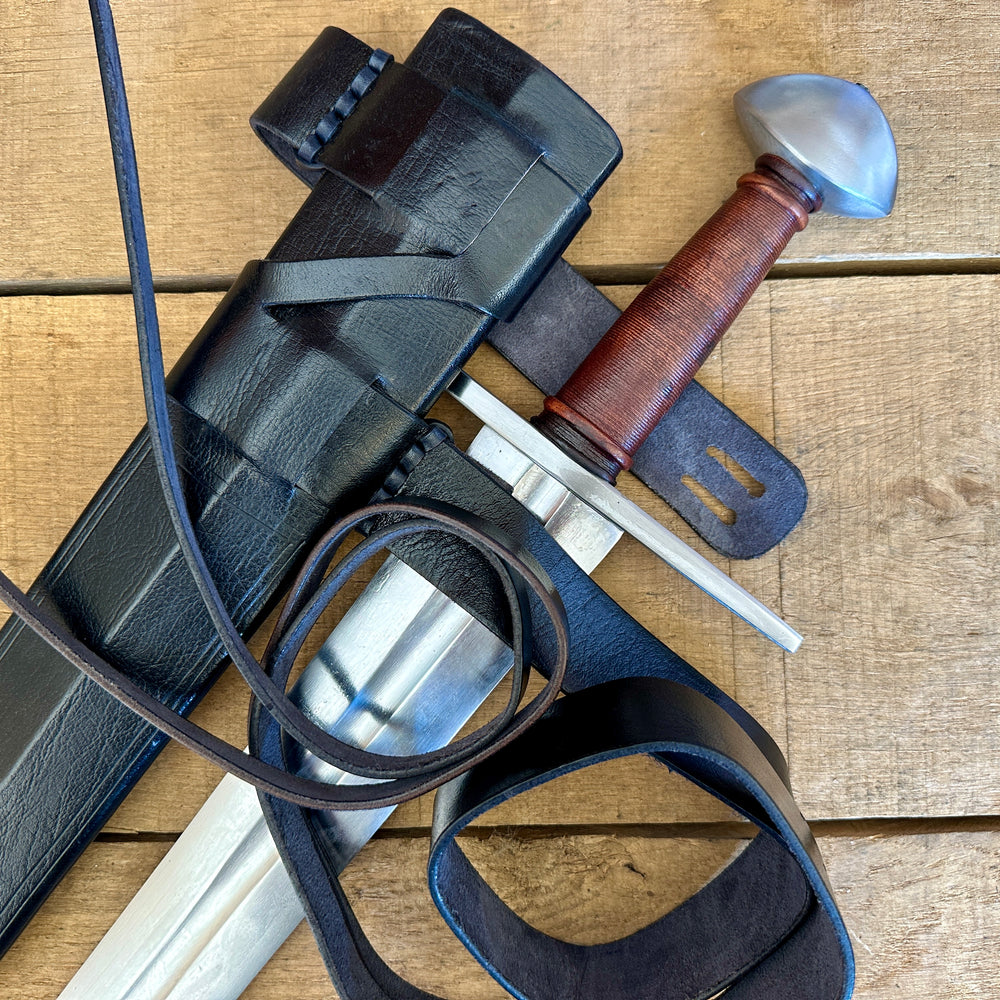 
                  
                    Viking Norman Brazil Nut Sword with a black scabbard 
                  
                
