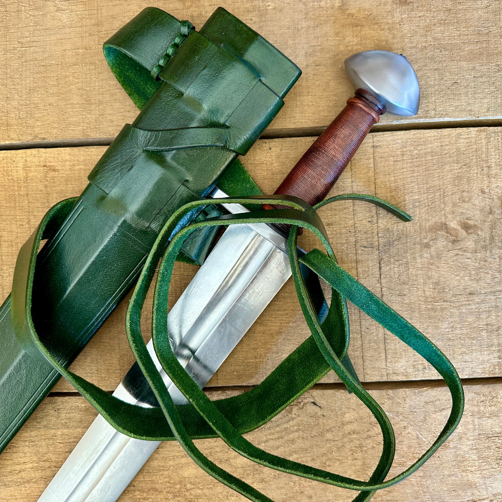 
                  
                    Viking Norman Brazil Nut Sword with a green scabbard 
                  
                