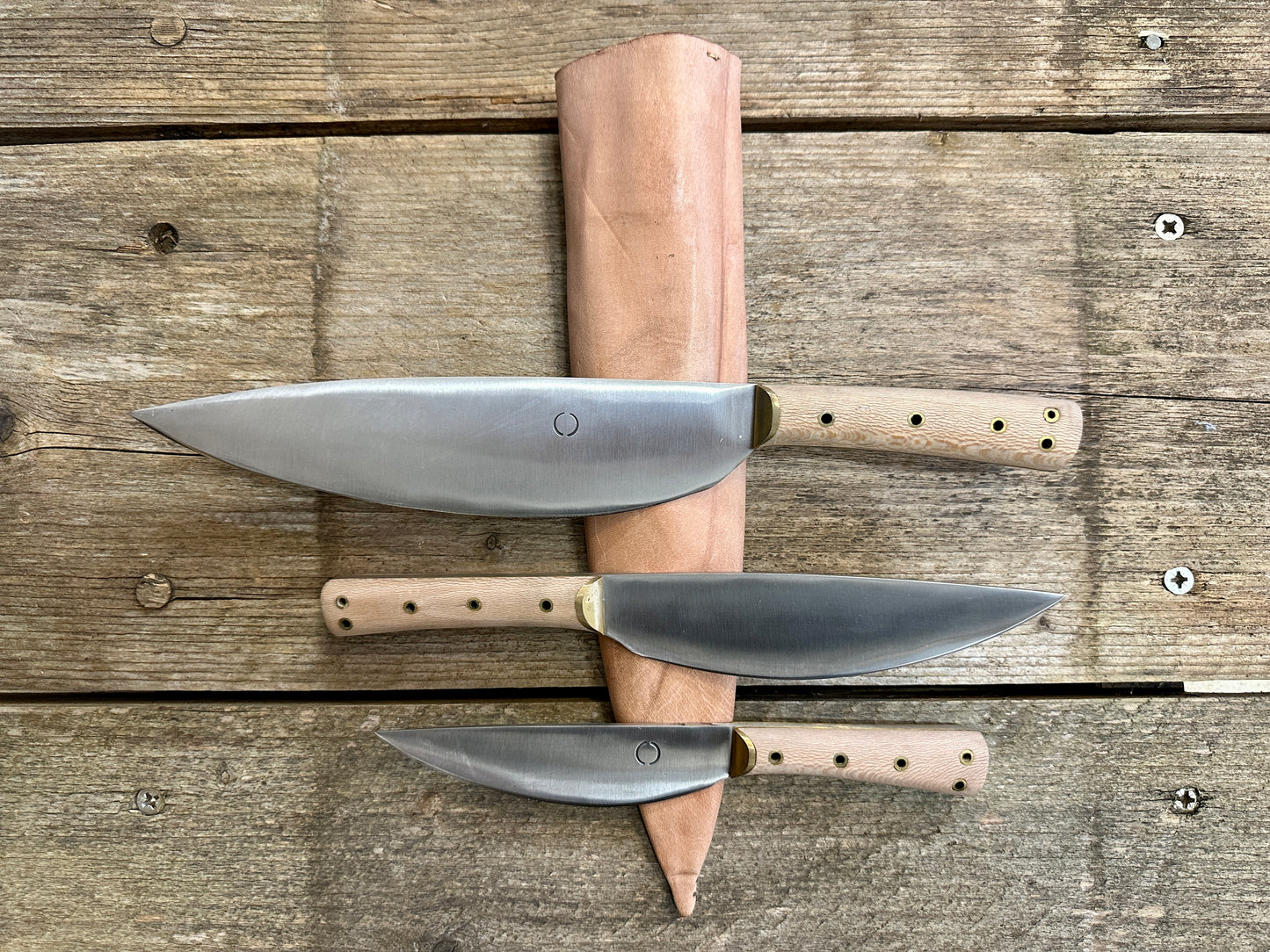 
                  
                    Set of three cooks knives
                  
                