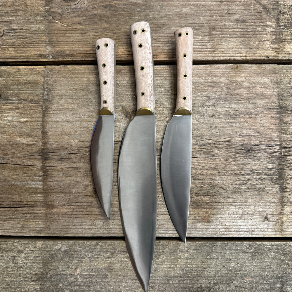 
                  
                    set of three cooks knives 
                  
                