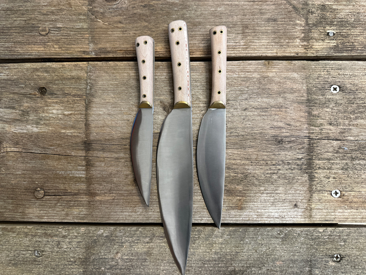 
                  
                    set of three cooks knives 
                  
                