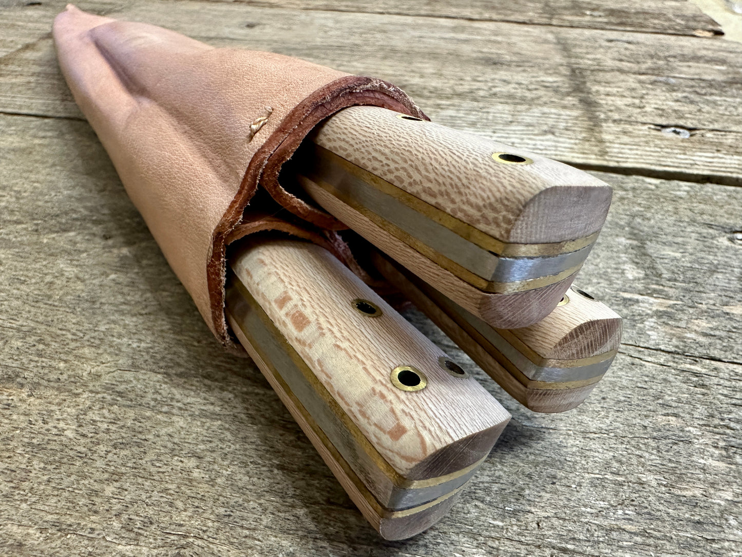 
                  
                    set of three cooks knives view from top
                  
                