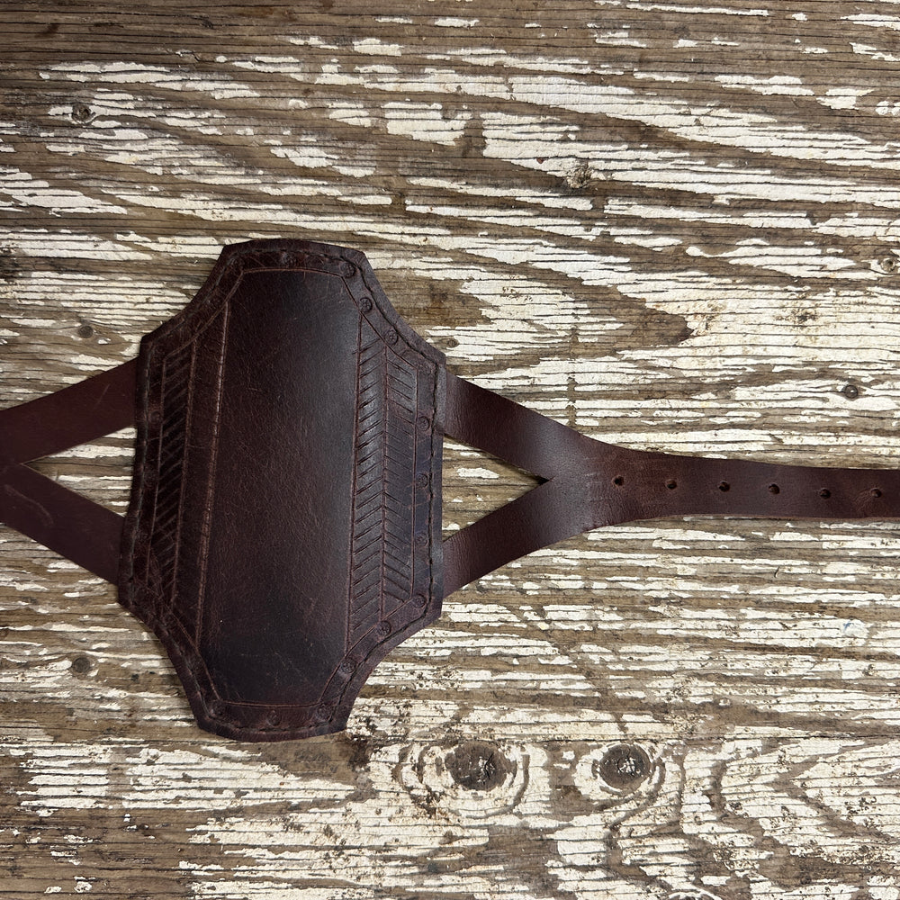 
                  
                    Rectangular archery bracer in brown
                  
                