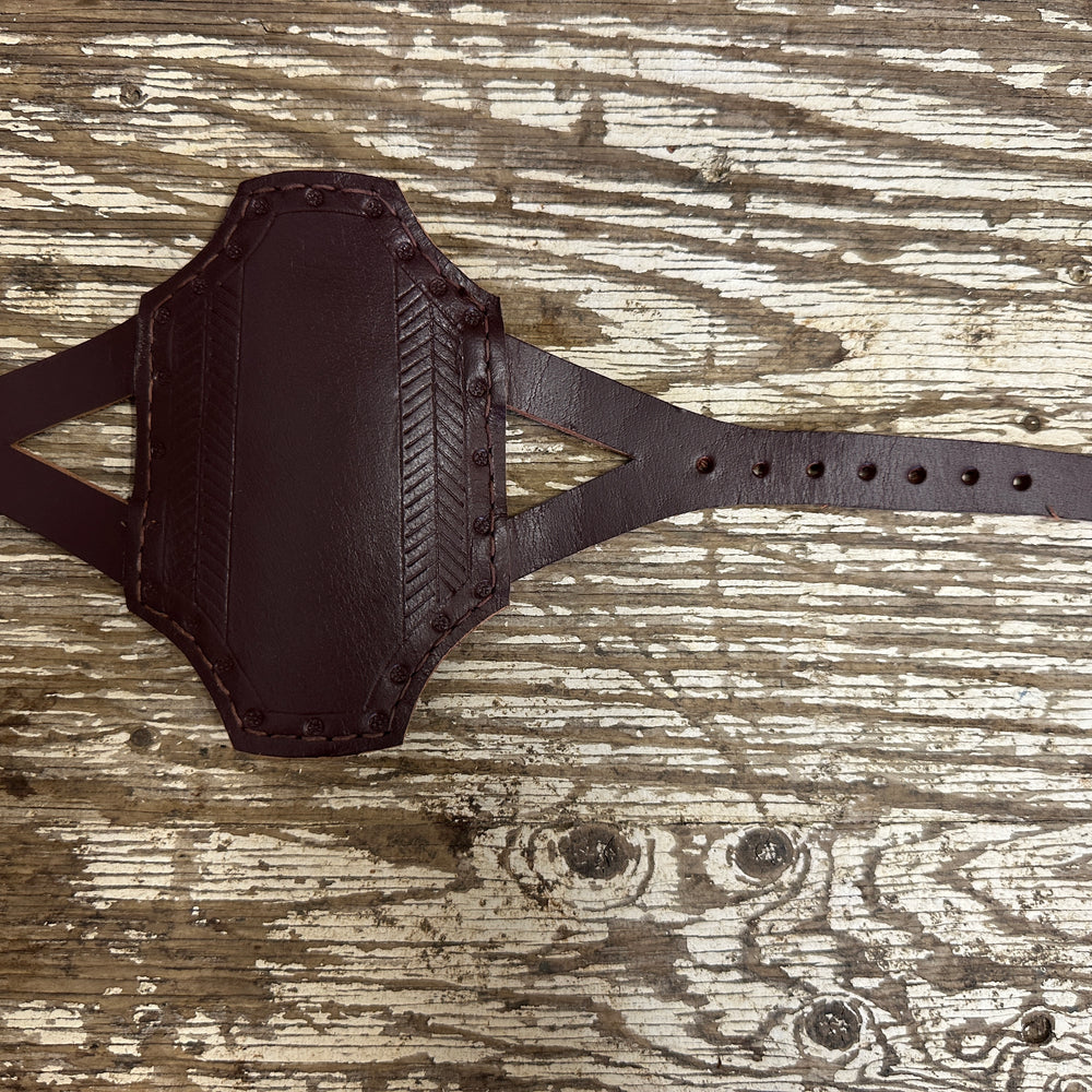 
                  
                    Rectangular archery bracer in red
                  
                