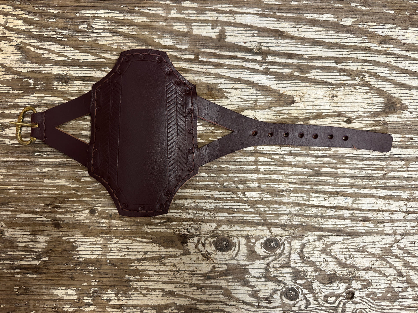 
                  
                    Rectangular archery bracer in red
                  
                