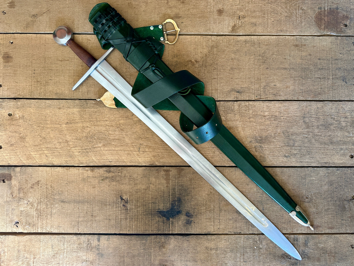 
                  
                    Type 13 Arming Sword with a green scabbard
                  
                
