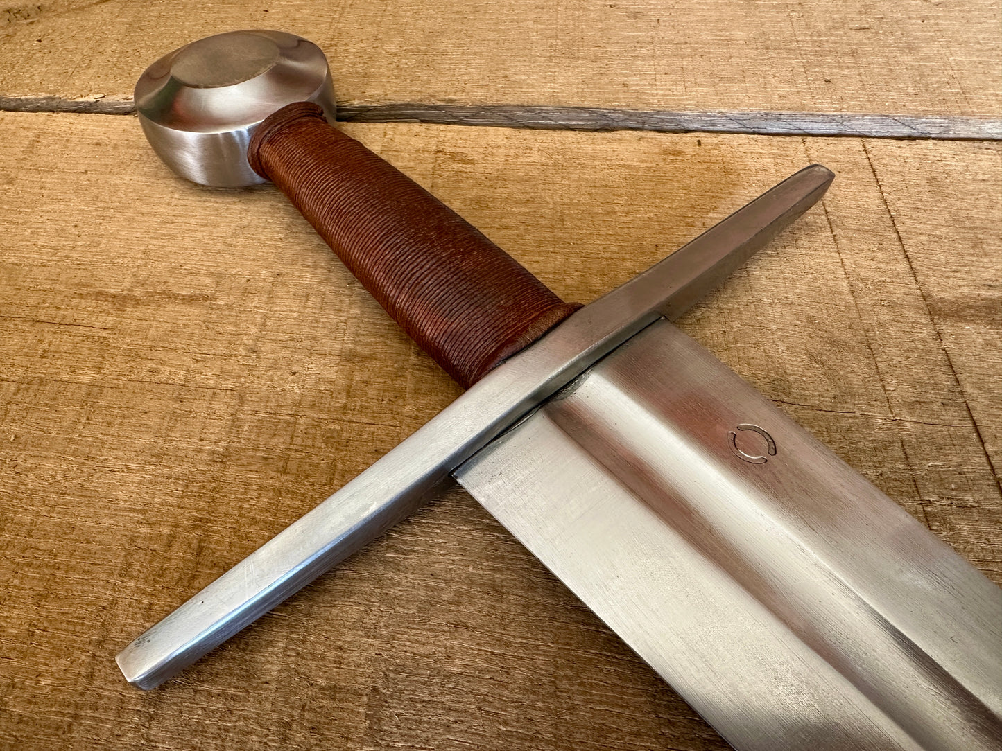 
                  
                    Type 13 Arming Sword showing a close up of the hilt
                  
                