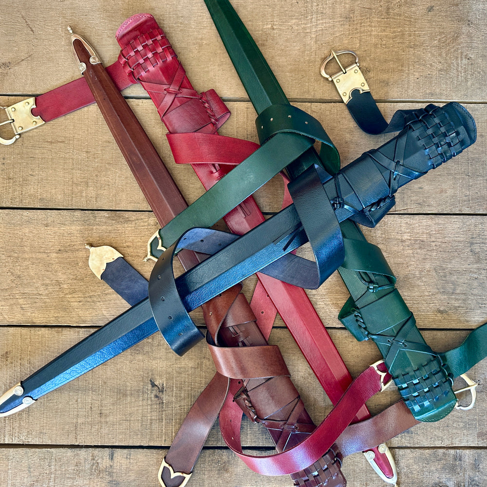 
                  
                    Type 13 Arming Sword scabbards in a pile 
                  
                