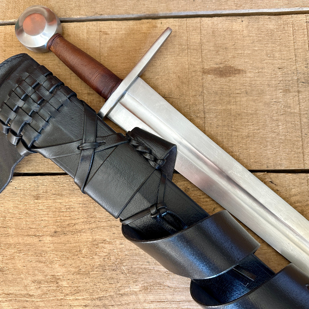 
                  
                    Type 13 Arming Sword with a black scabbard
                  
                