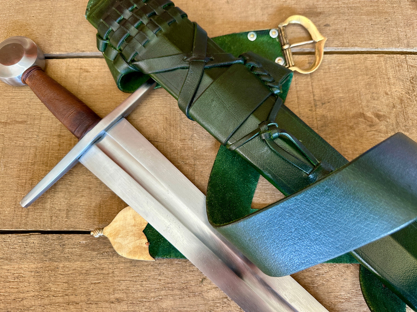 
                  
                    Type 13 Arming Sword with a green scabbard
                  
                