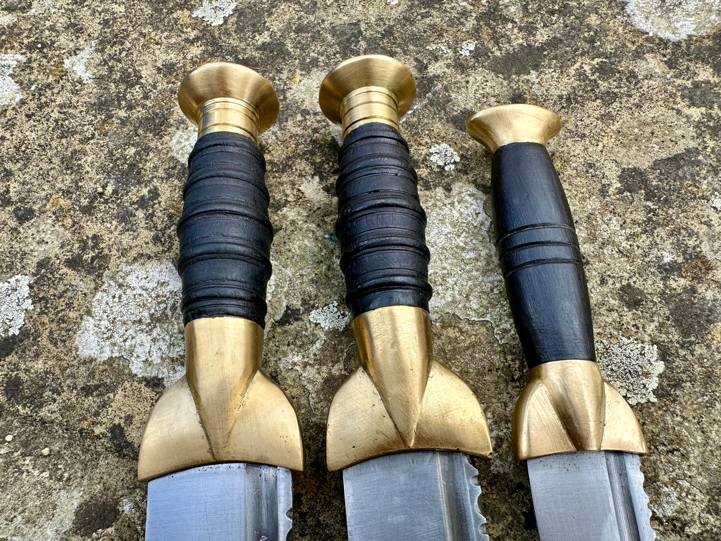 
                  
                    The Highland Bundle. Close up of hilts. 
                  
                