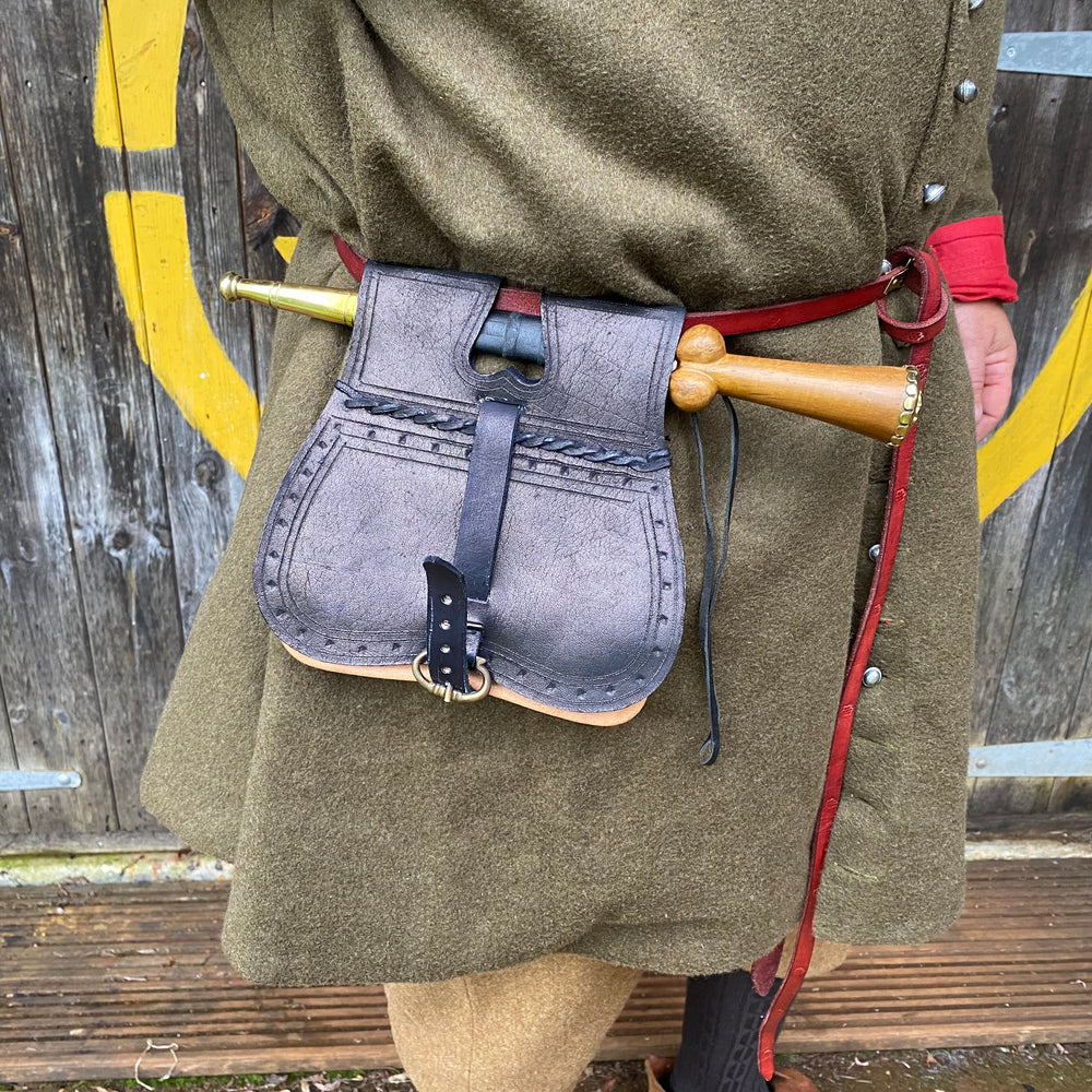 
                  
                    Tod wearing purse bollock dagger 
                  
                