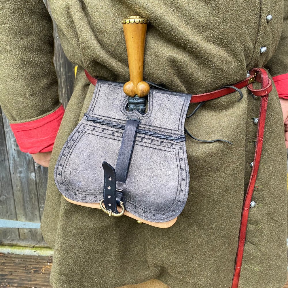 
                  
                    Tod wearing purse bollock dagger 
                  
                