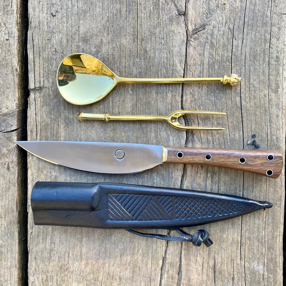 
                  
                    Tod Cutler eating knife (TCPA) and brass spoon and brass fork 
                  
                
