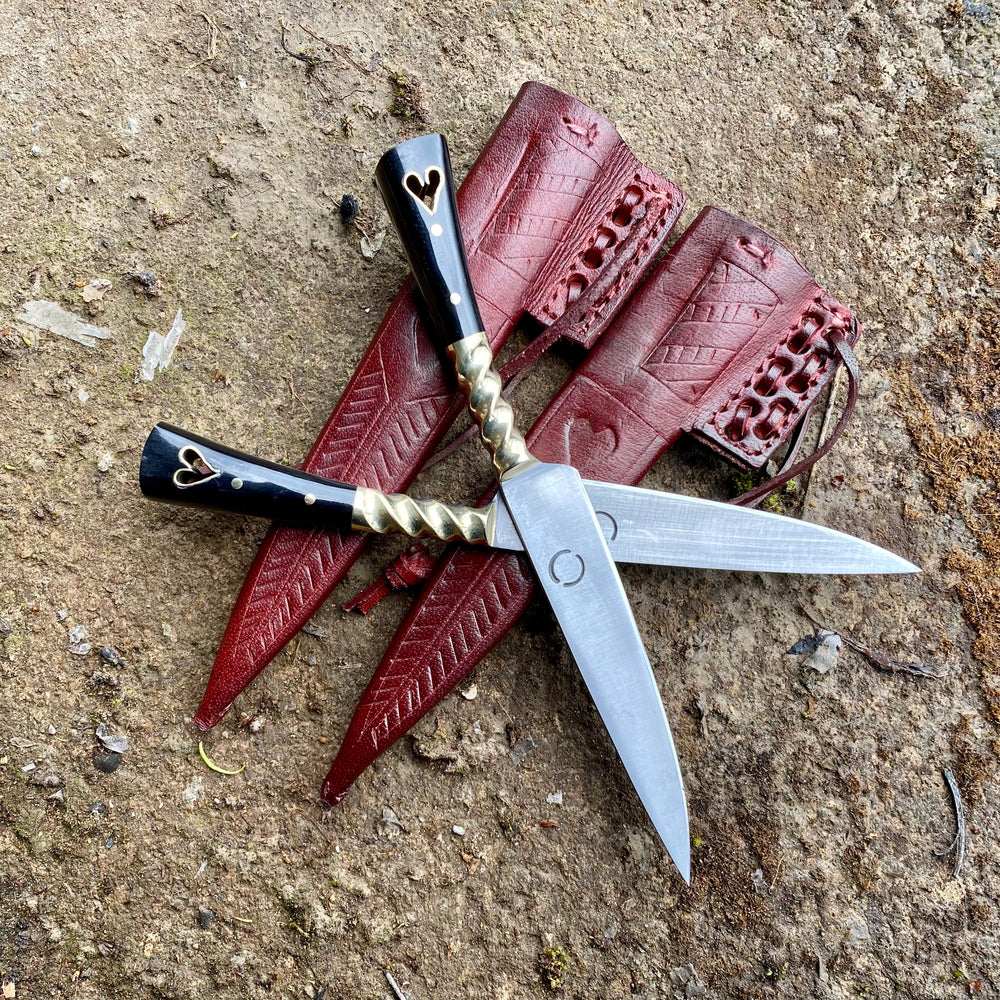 Pair of Tod Cutler heart eating knives 
