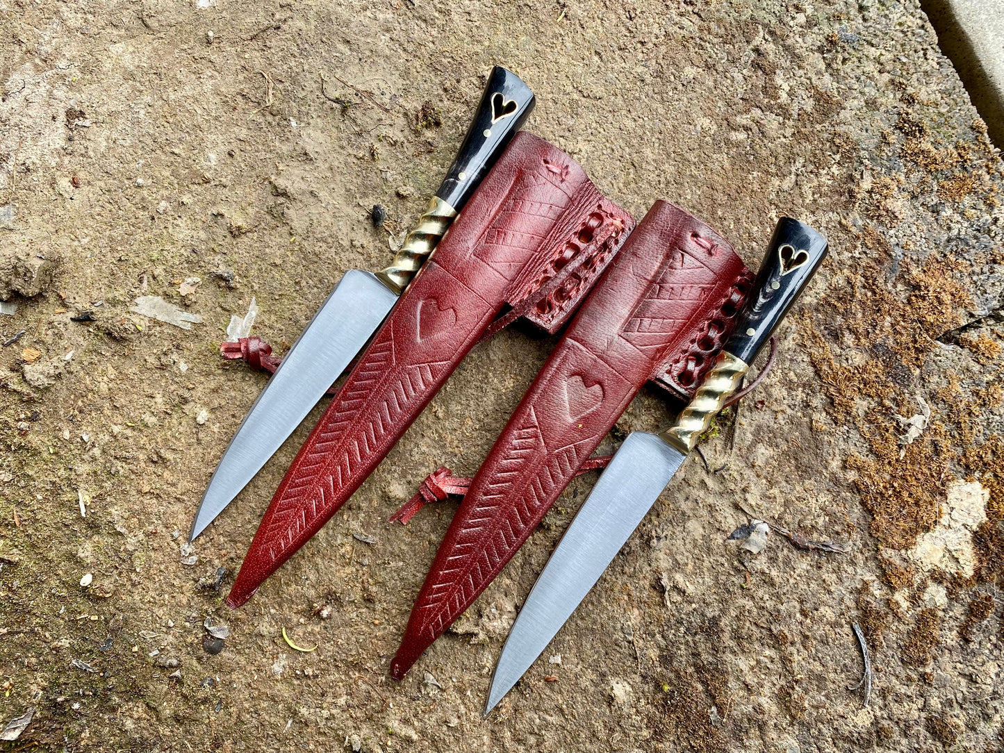 
                  
                    Pair of Tod Cutler heart eating knives 
                  
                