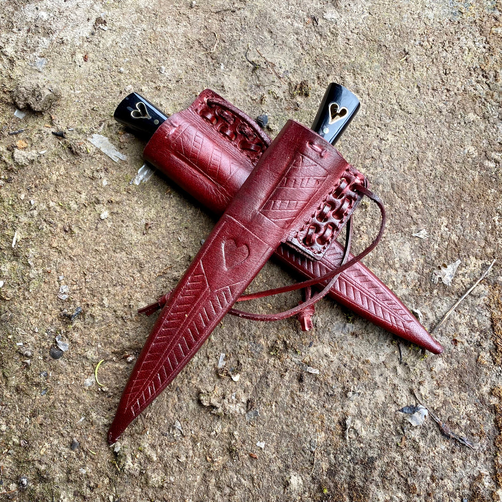 
                  
                    Pair of Tod Cutler heart eating knives 
                  
                