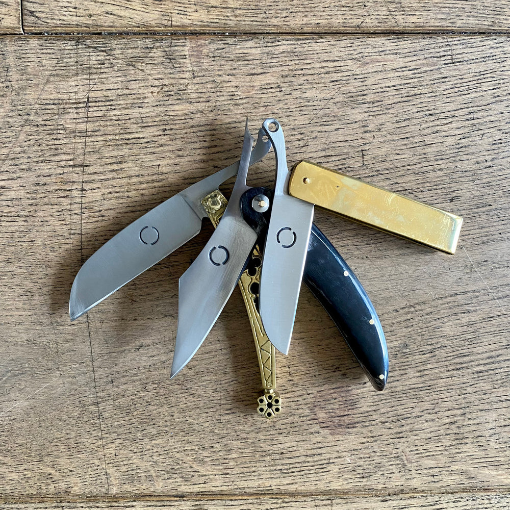 
                  
                    Set of three Tod Cutler folding knives in brass and horn. TCP64, TCP65 and TCP66
                  
                