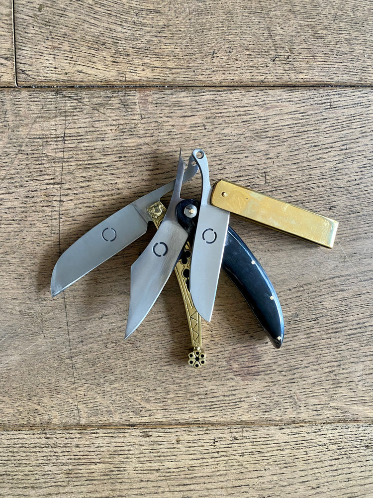 
                  
                    Set of three Tod Cutler folding knives in brass and horn. TCP64, TCP65 and TCP66
                  
                