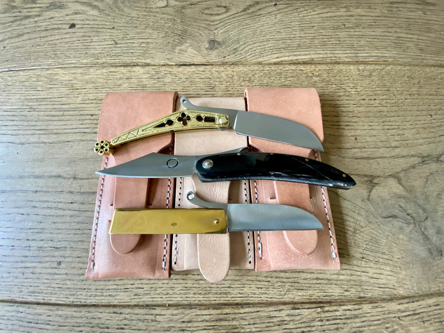 
                  
                    Set of three Tod Cutler folding knives in brass and horn. TCP64, TCP65 and TCP66
                  
                