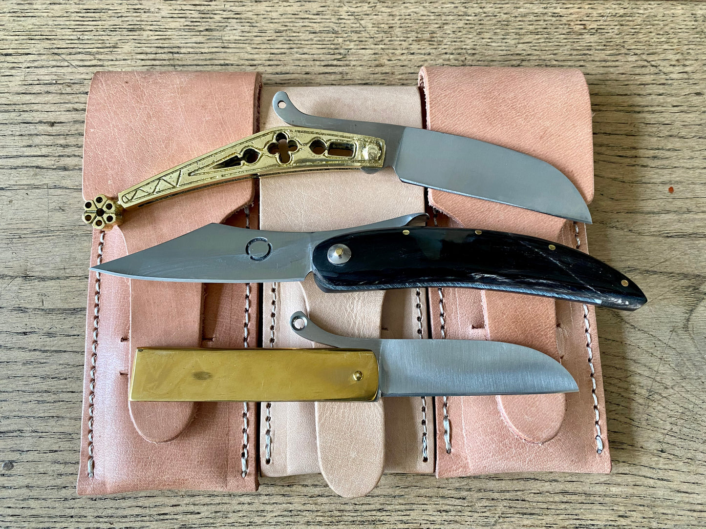 
                  
                    Set of three Tod Cutler folding knives in brass and horn. TCP64, TCP65 and TCP66
                  
                