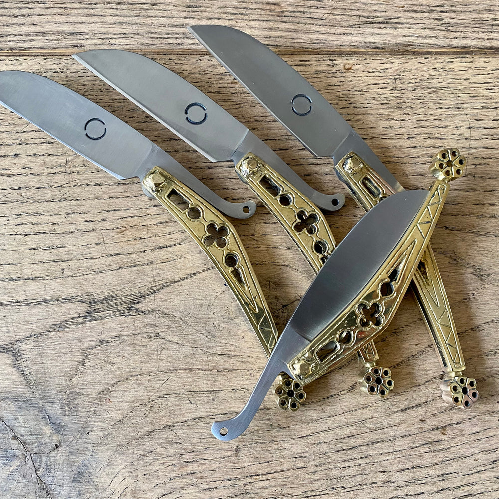 
                  
                    Tod Cutler brass folding knife TCP64
                  
                