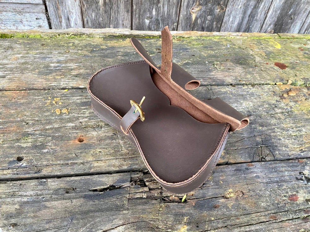 
                  
                    Leather belt pouch with buckle
                  
                