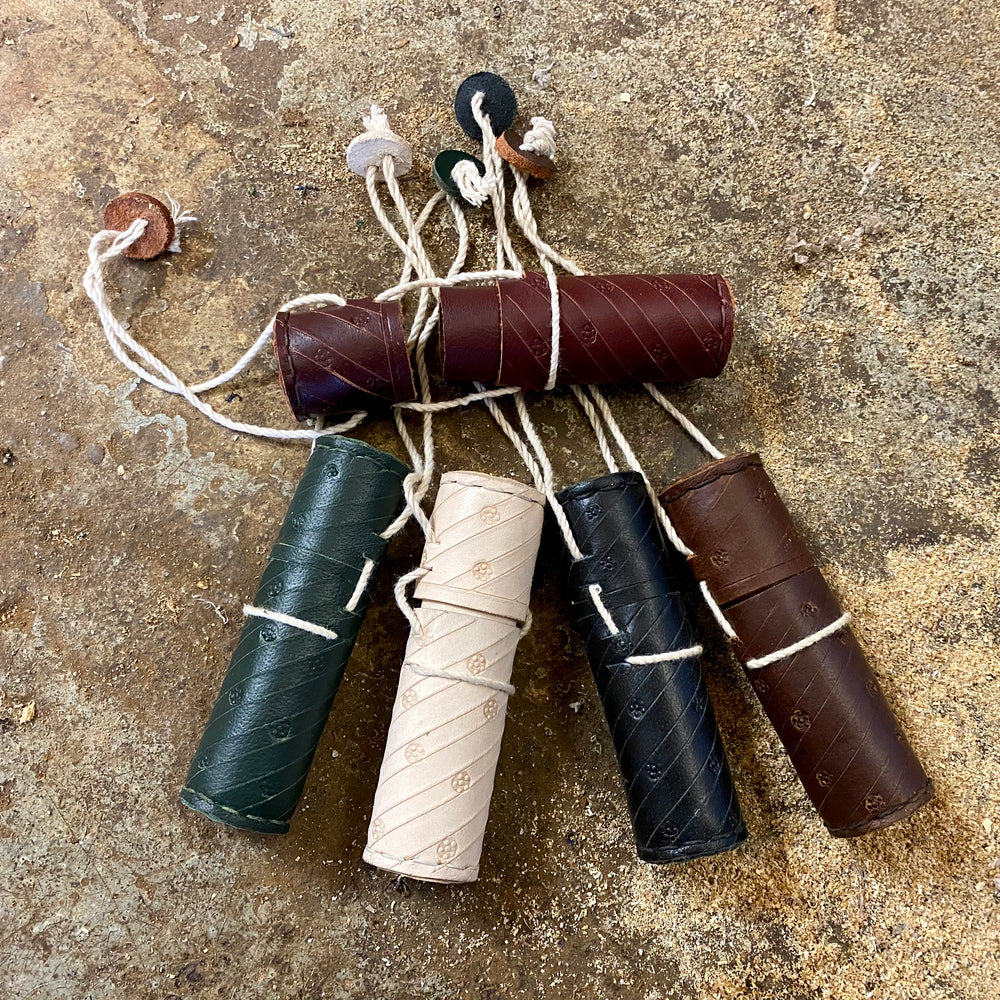 
                  
                    Tod Cutler leather needle case, brass two tine fork and brass spoon
                  
                